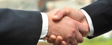 Bracewell Antitrust practice banner image, which shows a handshake.