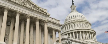 The image shows the outside of the United States Capitol building.
