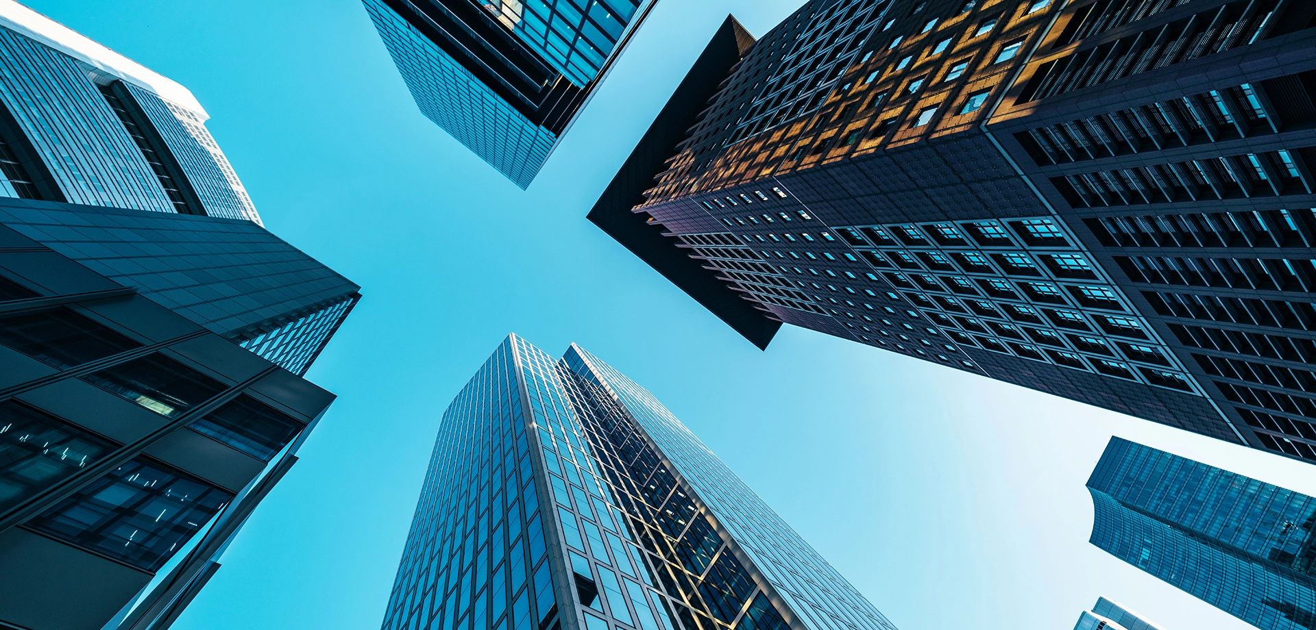 office buildings under a blue sky