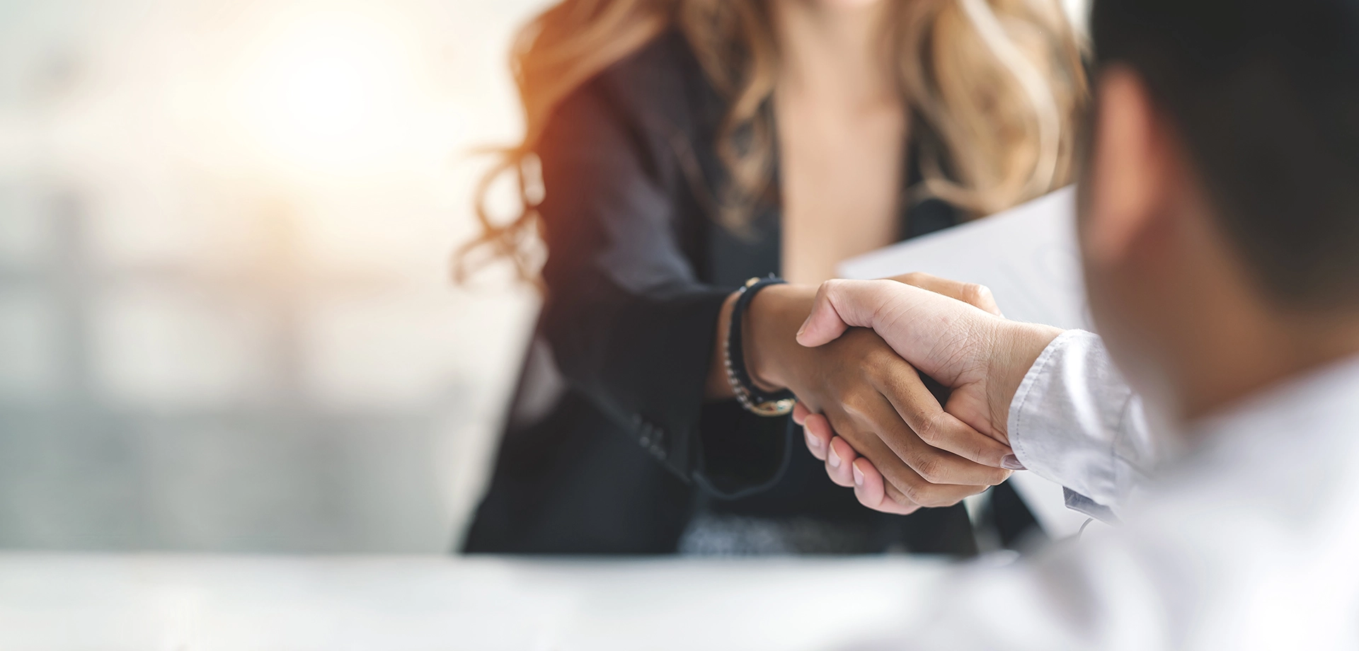 Two people shaking hands